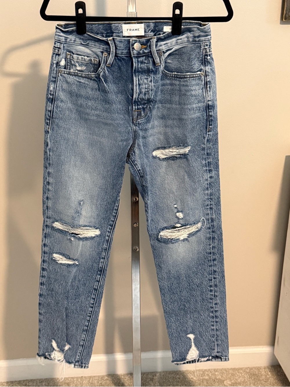 Frame Le Original Denim faded blue high-rise jeans with subtle distressing